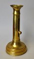 French Empire candlestick in brass, 19th century.