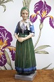 K&Co. presents: Dahl Jensen porcelain figurine of a Hedebo girl in Danish folk costume. DJ-1142...