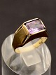 14 carat gold ring with pink colored stone