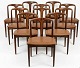 Lundin Antique presents: 8 Fantastic Johannes Andersen chairs in solid rosewood. Produced by Uldum Møbler ...
