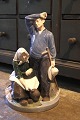 K&Co. presents: Large porcelain figurine from Royal Copenhagen of harvesters. H: 43cm. RC.1352. 1.sort...