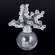 Lalique, perfume bottle with lily of the valley motif.