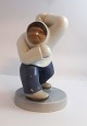 Lundin Antique presents: Bing & Gröndahl. Porcelain figure. Standing eskimo. Model 2415. Height 19 cm. (1 quality).