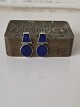Pair of silver earrings with lapis