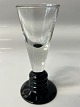 Shot glass on black base,Height: cm. 10.7 ...