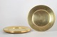 L'Art presents: Set of six brass charger plates, 1970s.