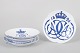 L'Art presents: Royal Copenhagen set of four commemorative plates.
