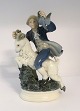 Lundin Antique presents: Dahl Jensen. Porcelain figurine. Clumsy Hans. Model # 1070. Height 21.5 cm. (1 quality)