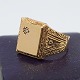 Antik Damgaard-Lauritsen presents: Flemming Kjerultt; Signet ring in 14k gold set with a diamond