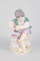 Meissen, boy with grape press figurine.