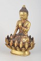 Gilt bronze Buddha figure.