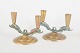 Tinos Denmark, pair of bronze candlesticks with dolphins.