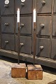 Old candlestick with wrought iron candle holder standing ...