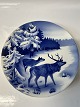 Deer among trees in winter.Ø 20,0 cm.