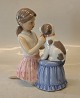Klosterkælderen presents: 0452 RC Girl dressing a dog a butterfly 17 x 16 cm from the series animal pets ...