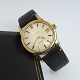 Antik Damgaard-Lauritsen presents: Omega; Constellation wristwatch in steel and gold, 1961