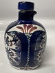 Tenera bottle with pouring spout and cork stopper. No. ...
