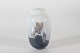 Royal CopenhagenSlim lidded jarwith flower motif