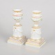L'Art presents: Royal Copenhagen, set of two Flora Danica candlesticks.