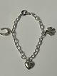 Bracelet with charms in silver.Length 15.7 cm.