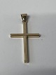 Cross pendant in 14 carat gold.Height 4.1 cm