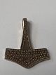 Thor's hammer, pendant in 8 Kt. gold.Height 2.1 cm.