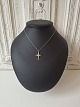 Gold-plated sterling silver cross necklace adorned with ...