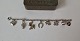 Karstens Antik presents: Vintage silver child's bracelet with 8 charms