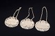 L'Art presents: Three silver decanter labels.