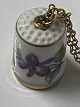 Antik Huset presents: B&G thimble with a purple violet and gold edge on a gold-plated 60 cm chain.