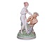 Antik K presents: Large Royal Copenhagen figurineThe Hand Kiss by Gerhard Henning