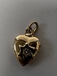 14 carat gold. Heart with inlaid diamond.Charms / ...