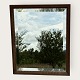 Small beveled mirrorin a wooden frame*DKK 450