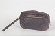 Louis Vuitton Marly Dragonne GM wristlet bag.