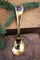 K&Co. presents: Year's Christmas spoon from Georg Jensen (1974) in gold-plated sterling silver with enamel flower.