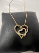 Antik Huset presents: 14 kt Heart pendant with inlaid diamonds and Necklace.Length 51.8 cm