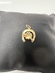 14 carat gold. Horseshoe with a Four-leaf ...
