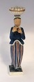 Royal Copenhagen. Porcelain figure. The woman with the ...