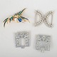 Set of one belt buckle and three brooches.