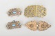 Set of three belt buckles and one brooch.