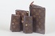 Louis Vuitton, two key holders, wallet and pochette.