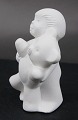 Stone Art white figurine from Marbell, Belgium. Child with teddy bear