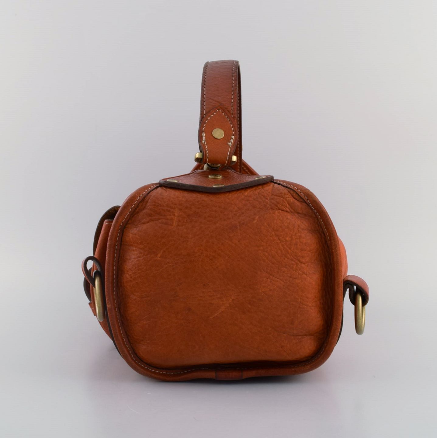  Vintage Mulberry handbag in core leather with brass  clasps and buckles. 1980s. *