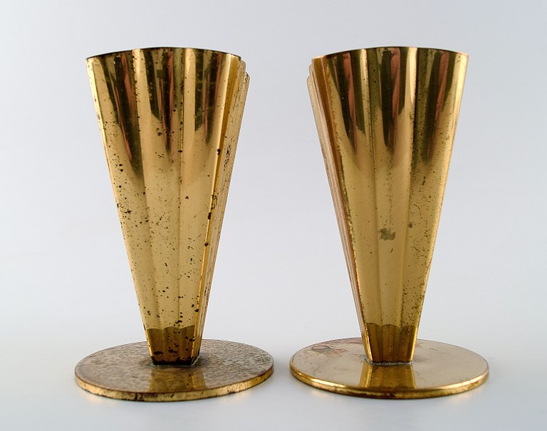 A pair of brass vases, Ystad metal.
