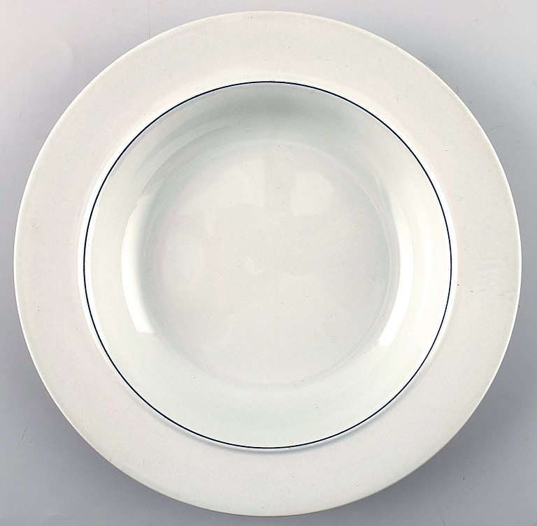 2 dybe tallerkener til suppe/pasta/grød/yoghurt. Aluminia blå kant, fajance. Blå 
Kant tegnet af Grethe Meyer for Aluminia og senere Royal Copenhagen.
