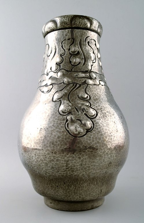 Art nouveau vase in hammered tin/pewter. 
Stamped with Arendal