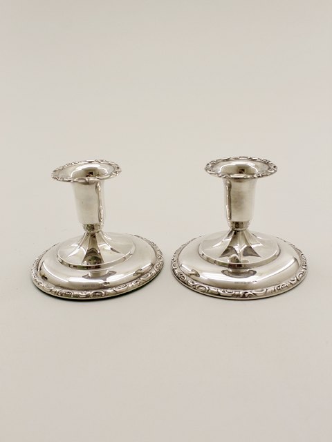 A pair of 830 silver candlesticks