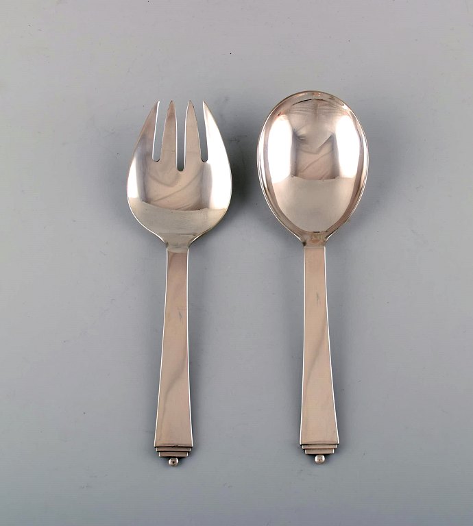 Georg Jensen Pyramid serving cutlery in sterling silver.
Designed by Harald Nielsen 1933-44.
