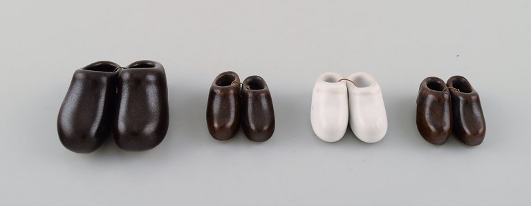 Höganäs. Collection of four pairs of miniature clogs in ceramic. 1970s.
