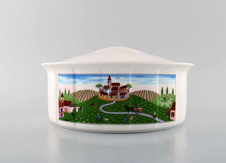 Villeroy & Boch Naif dinner service in porcelain. Oval lidded tureen decorated 
with naivist village motif.